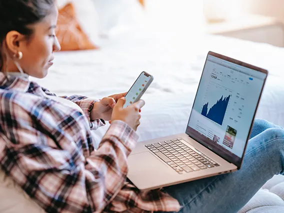 A young woman looking over her financial documents