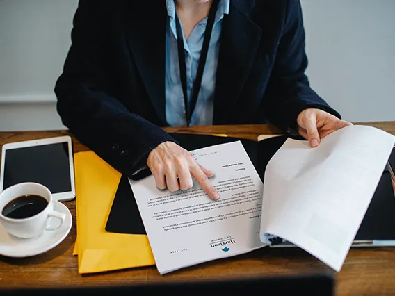 lawyer looking over a contract